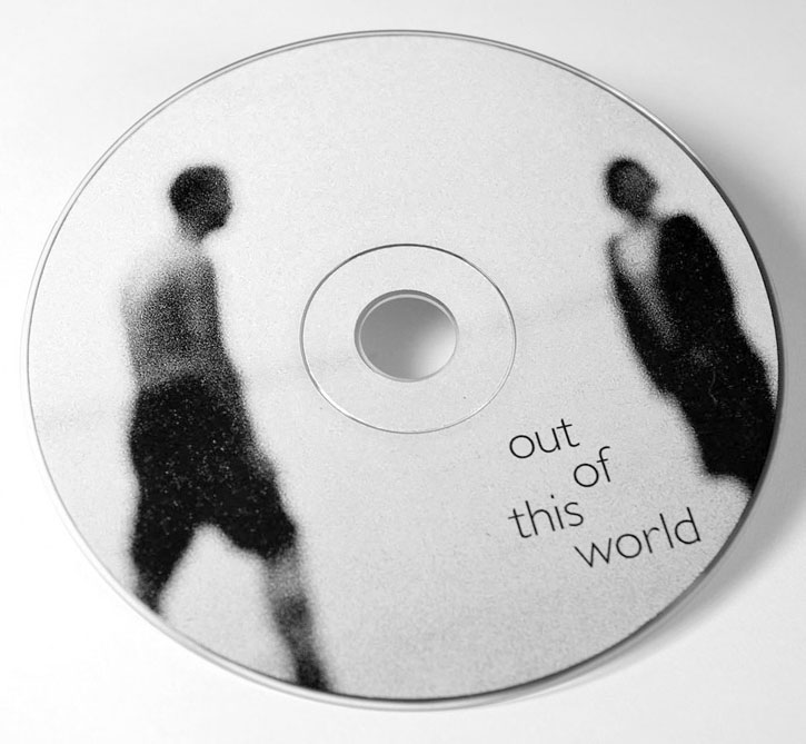 image of cd with people out of focus
