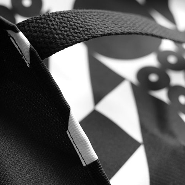 Close up image of black and white tote.